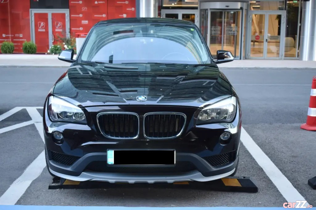 BMW X1 2014 — imagine 36