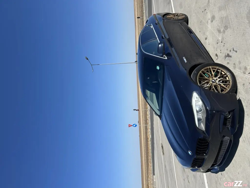 BMW Seria 5 2011 — imagine 13