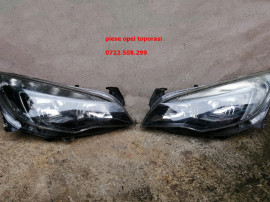 Faruri Opel Astra J fond negru