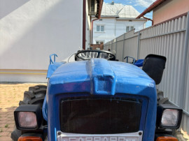 Tractor articulat Antonio Carraro cu remorca hidraulica