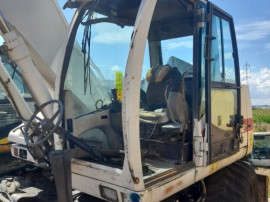Cabina excavator pe roti Case WX145