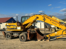 Dezmembrez excavator pe roti JCB JS 160 W