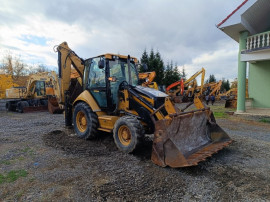 Buldoexcavator CAT 428E, 2007, cupă multifuncțională