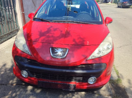 Peugeot 207 1 4 benzină 95 cai roșu an 2009